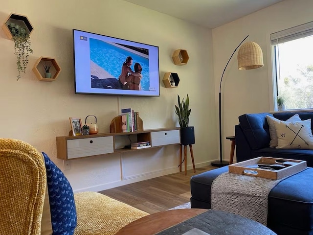 living room with light hardwood / wood-style floors