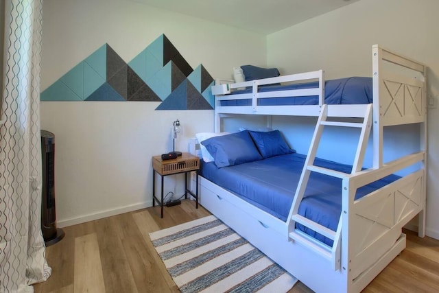 bedroom featuring wood-type flooring