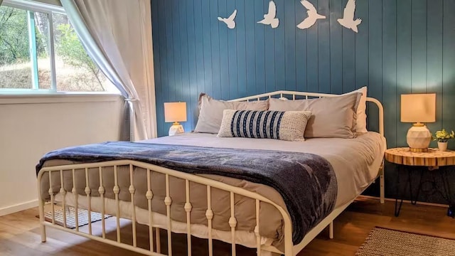 bedroom featuring hardwood / wood-style floors