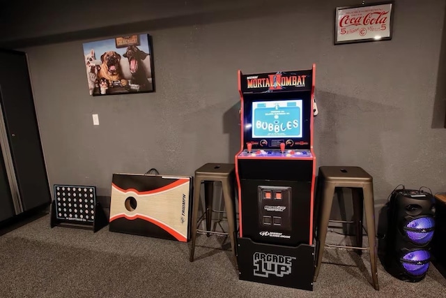 recreation room with carpet flooring