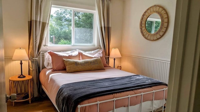 bedroom featuring dark hardwood / wood-style flooring