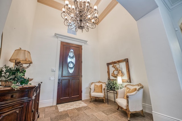 foyer with an inviting chandelier and a high ceiling