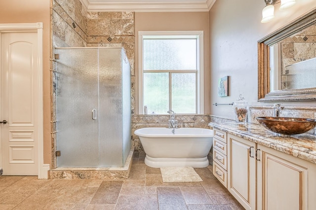 bathroom with vanity, crown molding, and shower with separate bathtub