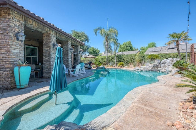 view of pool with a patio area