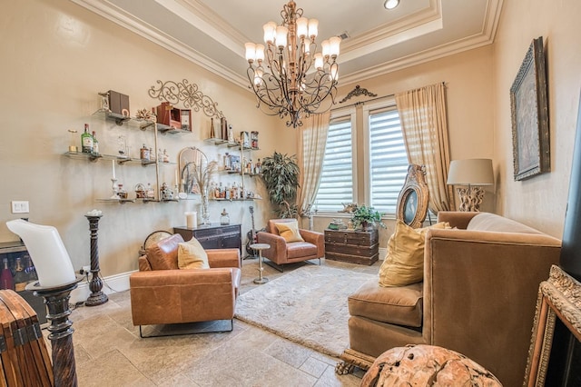 living area with crown molding, a raised ceiling, and a chandelier