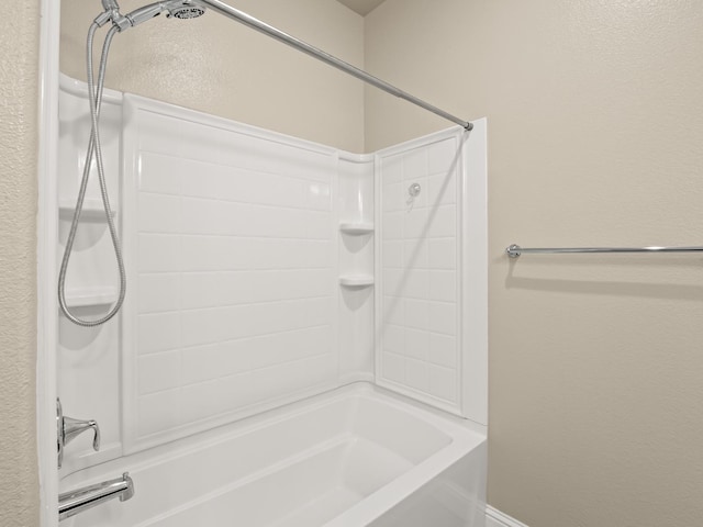 bathroom with shower / bath combination