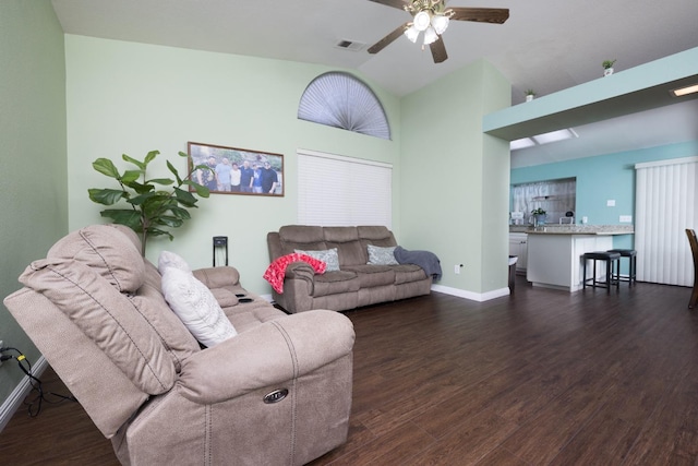 living room with dark hardwood / wood-style floors and ceiling fan