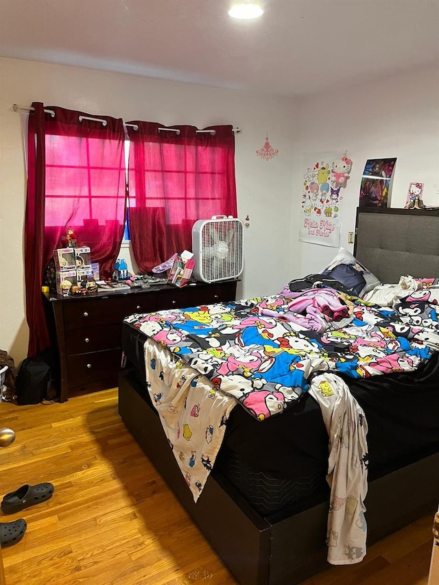 bedroom with light hardwood / wood-style floors