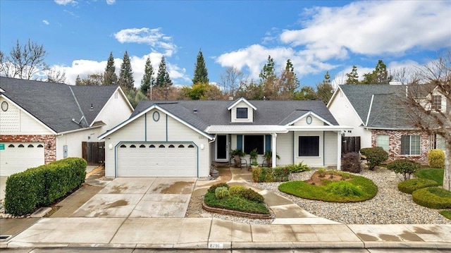 view of front of home featuring a garage and covered porch