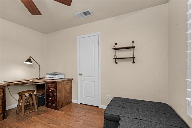 office space featuring ceiling fan and hardwood / wood-style floors