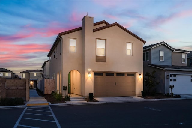 view of front of home with a garage