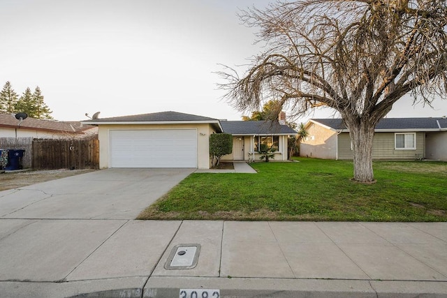 ranch-style house with a garage and a front lawn