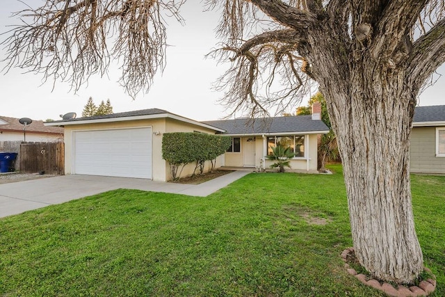 single story home with a garage and a front lawn