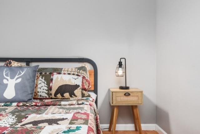 bedroom featuring hardwood / wood-style floors