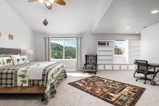 carpeted bedroom with ceiling fan