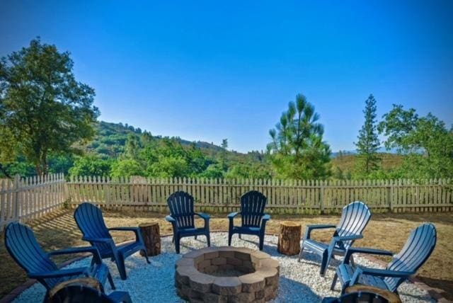 view of patio with a fire pit