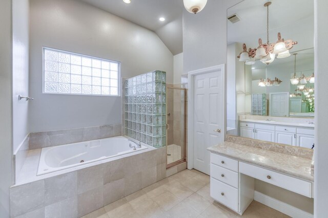 bathroom with tile patterned floors, a chandelier, vaulted ceiling, vanity, and plus walk in shower