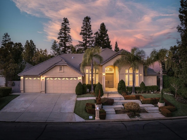 view of front of property featuring a garage