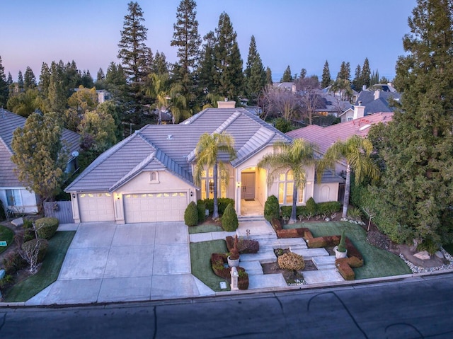 view of front of property featuring a garage