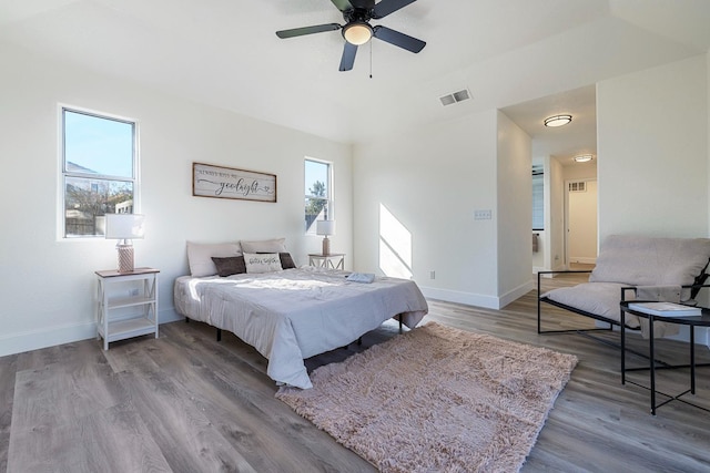 bedroom featuring ceiling fan and light hardwood / wood-style flooring