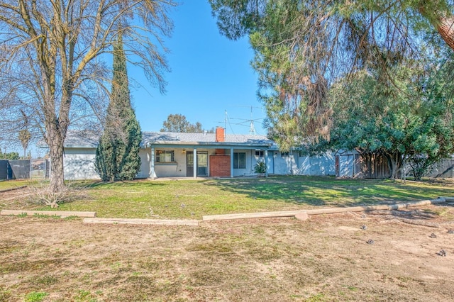 ranch-style house with a front yard