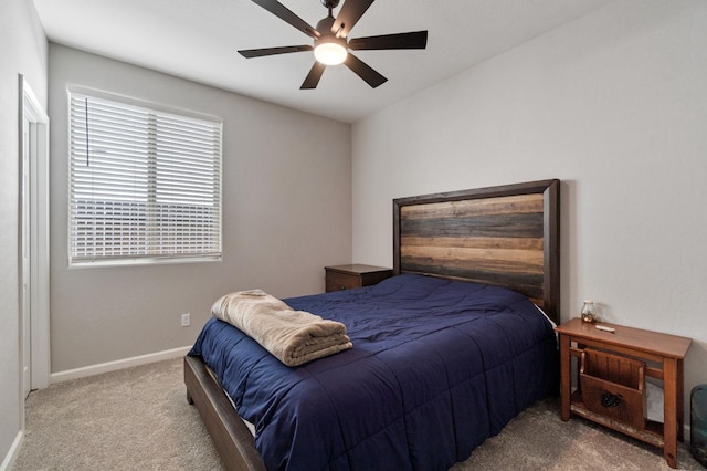 bedroom with ceiling fan and carpet