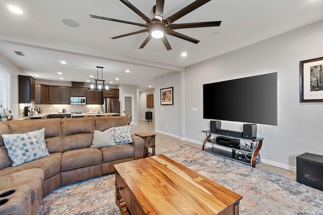 living room featuring ceiling fan