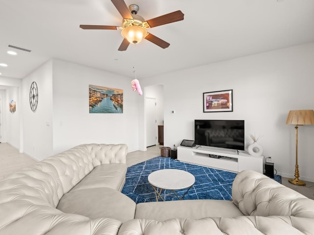 living room with ceiling fan