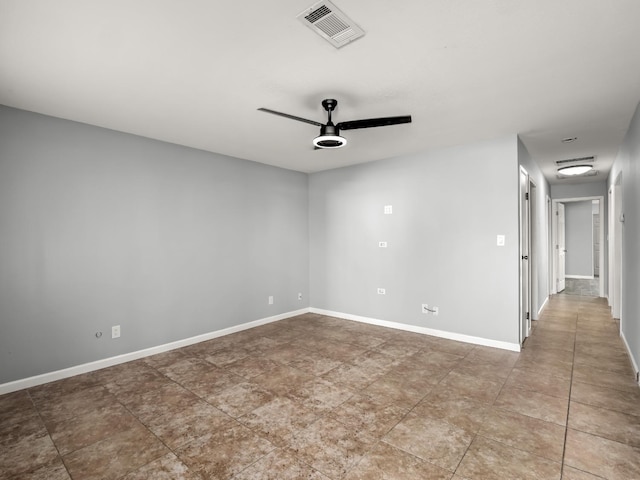 unfurnished room with ceiling fan