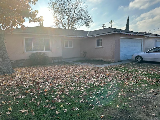 view of property exterior with a garage