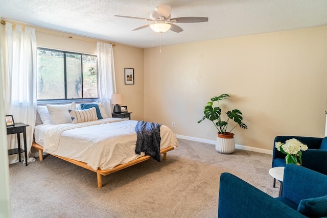 42959 Ranger Circle Ct, Coarsegold, CA 93614 - carpeted bedroom with a textured ceiling, baseboards, and ceiling fan