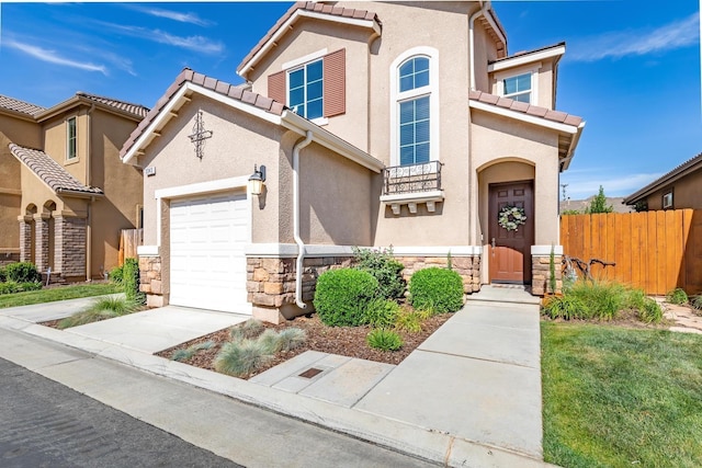 view of front of property featuring a garage