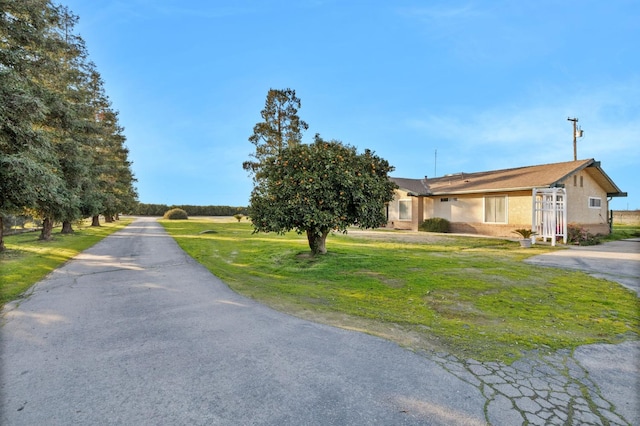 view of front of home with a front lawn