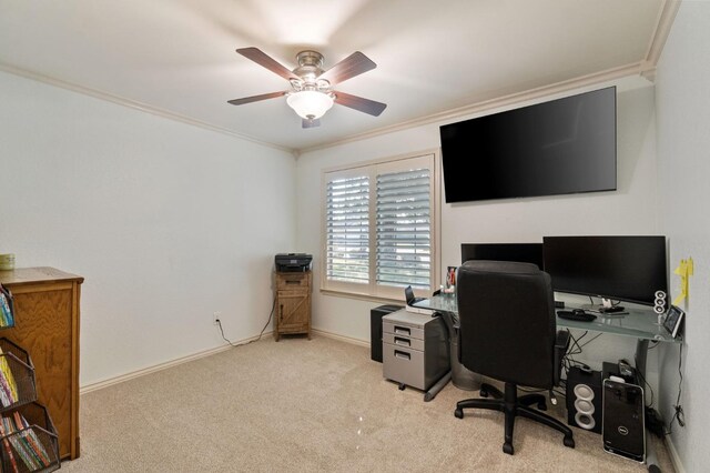 office featuring light carpet, ornamental molding, and ceiling fan