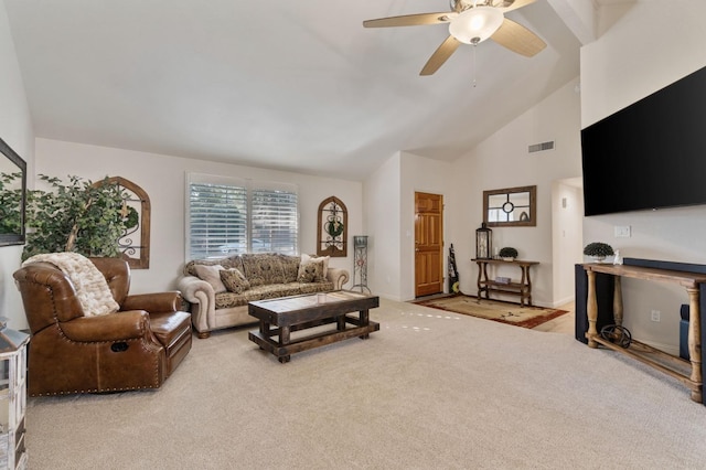 living room with high vaulted ceiling, carpet floors, visible vents, baseboards, and a ceiling fan