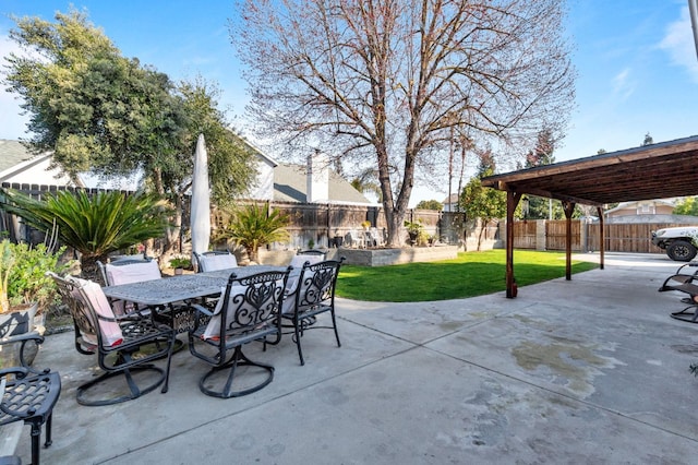 view of patio / terrace with outdoor dining area and a fenced backyard