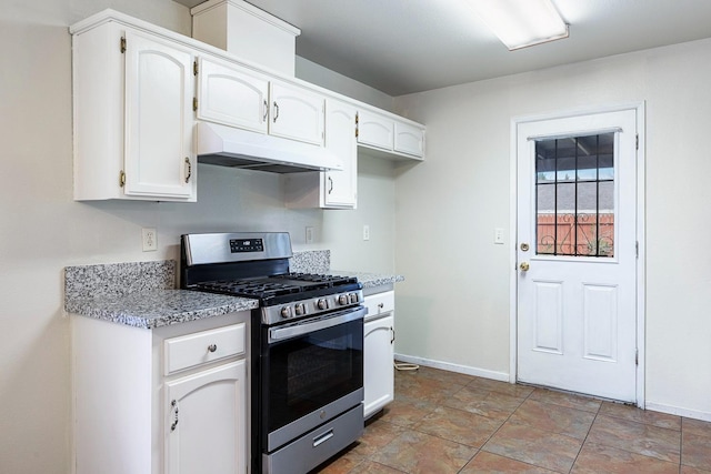 kitchen with white cabinetry and gas range