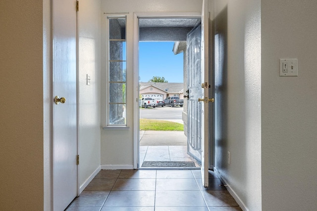 entryway featuring light tile patterned floors