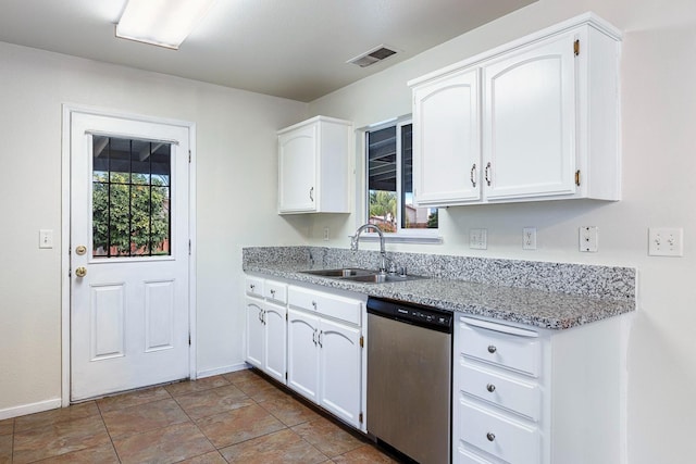 kitchen with white cabinetry, dishwasher, sink, and light stone countertops