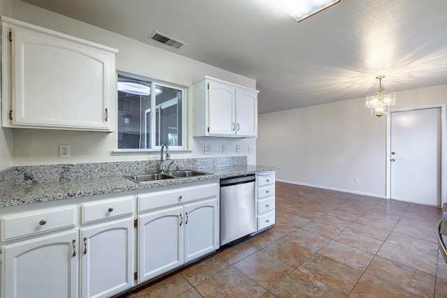 kitchen featuring white cabinetry, dishwasher, and sink