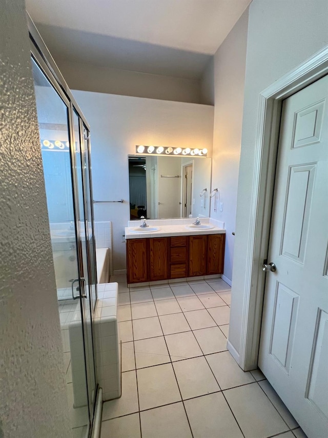 bathroom with vanity, separate shower and tub, and tile patterned floors