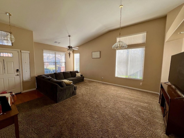 carpeted living room with lofted ceiling and ceiling fan