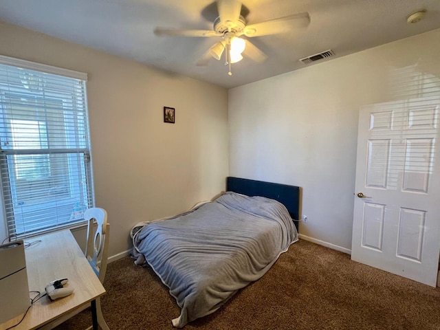 bedroom featuring ceiling fan and carpet floors