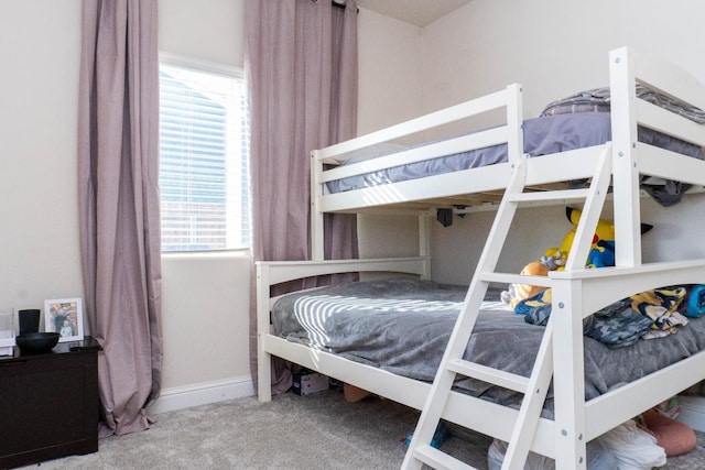 bedroom featuring carpet