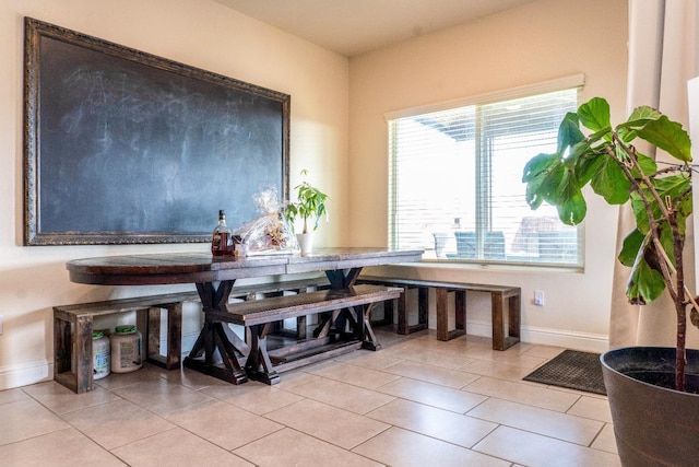 view of tiled dining space