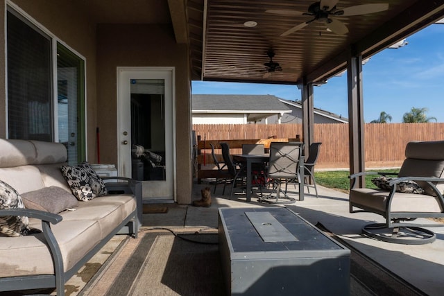 view of patio featuring outdoor lounge area and ceiling fan