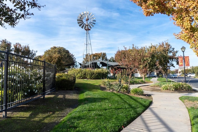 surrounding community featuring a lawn