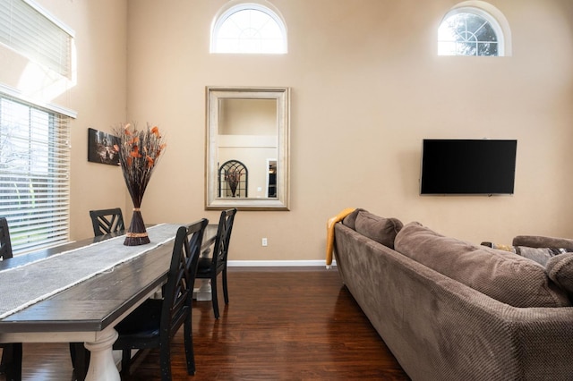 dining room with dark hardwood / wood-style floors