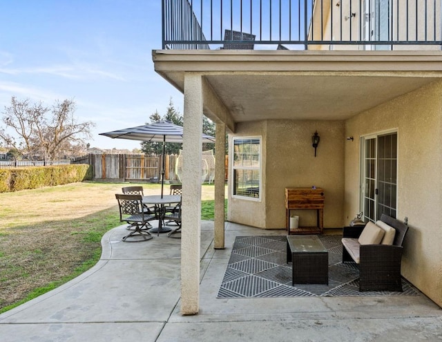 view of patio / terrace featuring a balcony