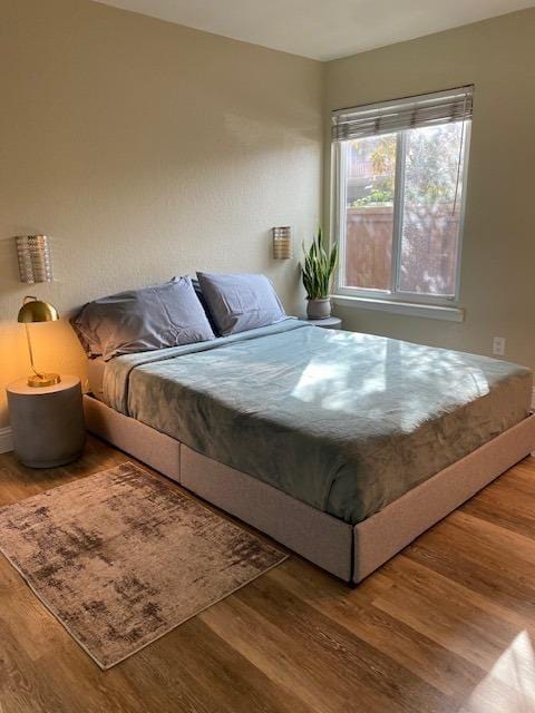 bedroom featuring hardwood / wood-style floors